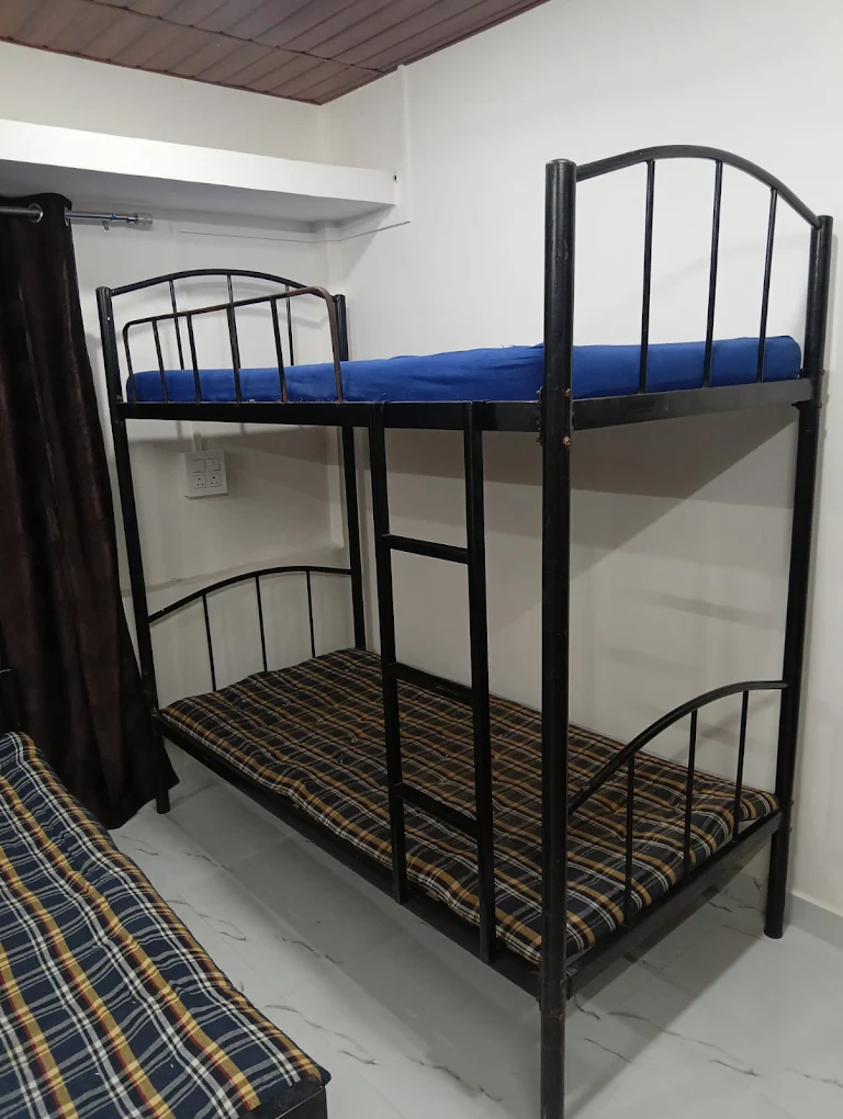 Common area at Queen Quatters safe girls PG Nigdi Pune