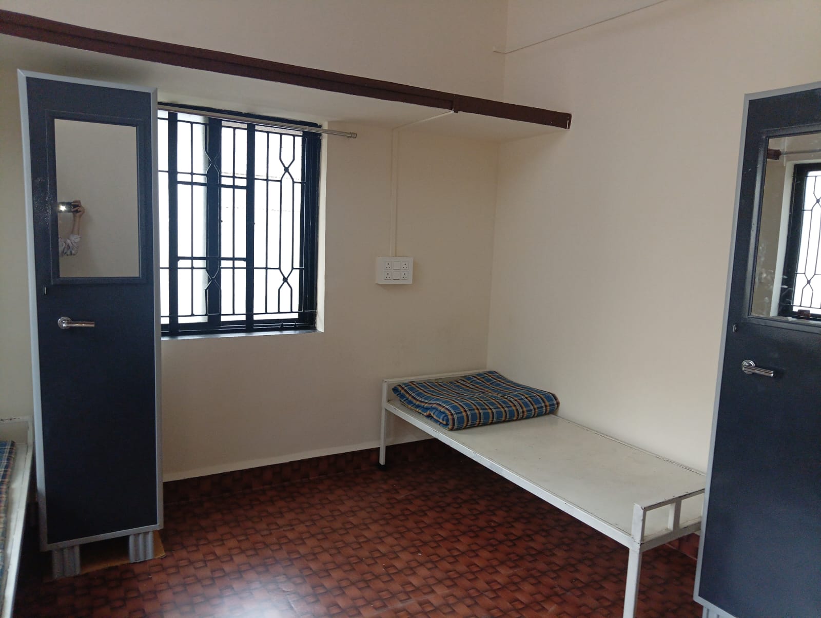 Spacious sharing room with two wardrobes at Queen Quatters girls PG Nigdi